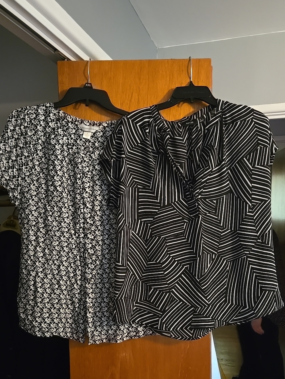 2 Black And White Patterned Blouses